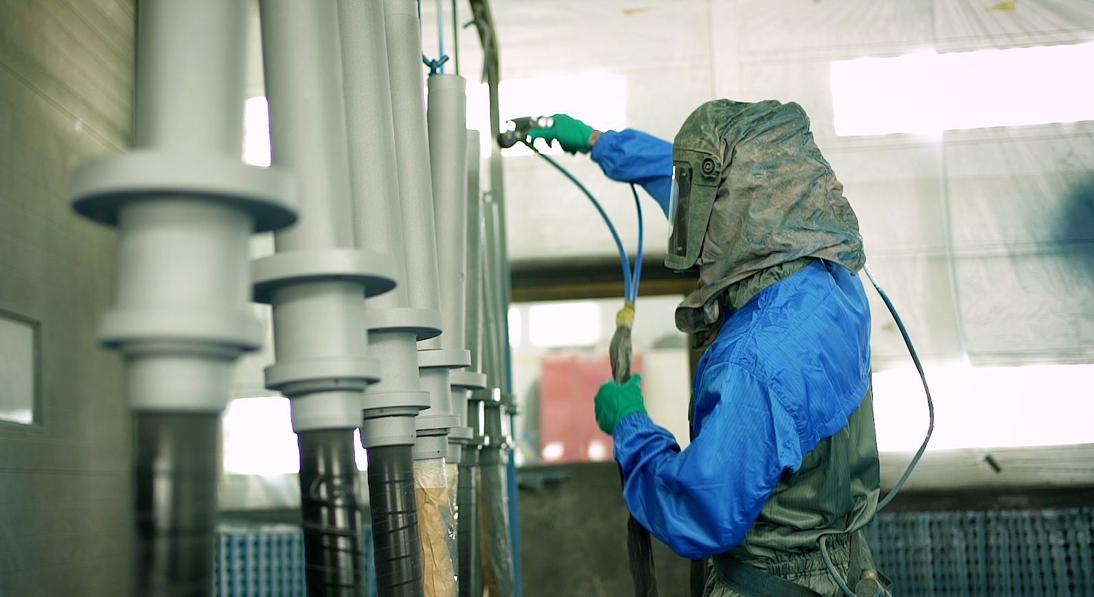 Person applying a coating