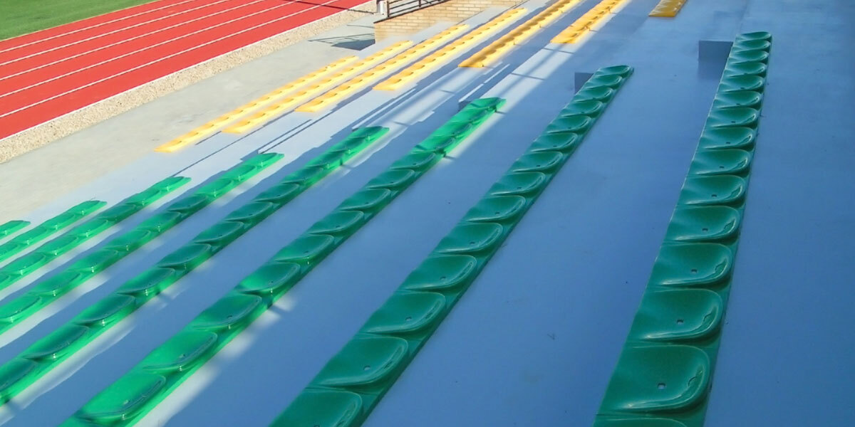 Stadium with surface lacqour
